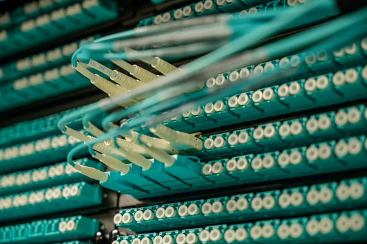 Dense fiber optic patch cords connected to a server rack